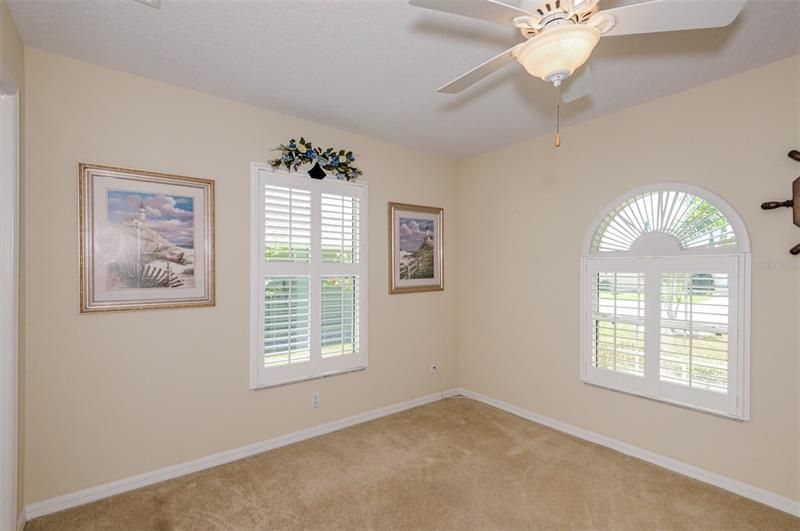 Bedroom 2 w/ Plantation Shutters...Faces out front of home