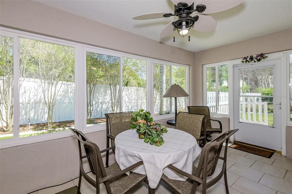 Light & Bright Glass Enclosed Florida Sunroom w/ Tile