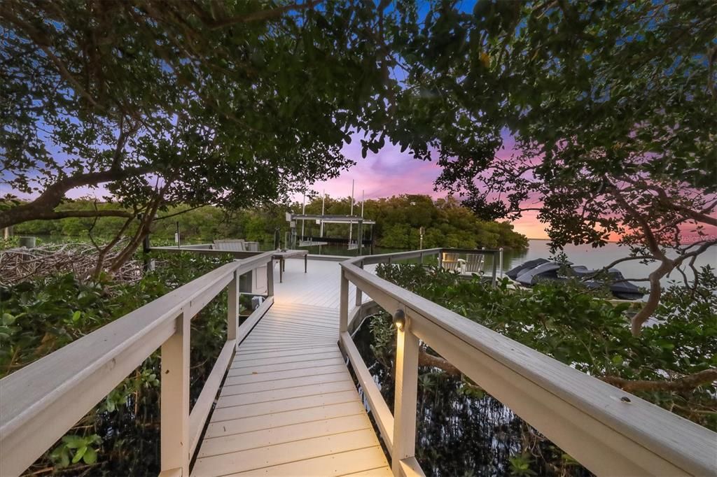 The private path to your dock that supports a deep-water vessel, jet skis, and many more toys!