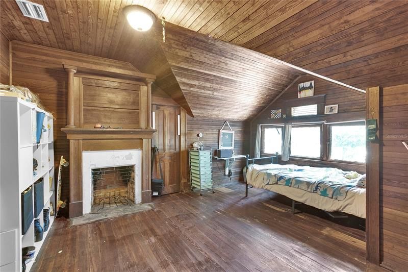 Upstairs Bedroom 4 with fireplace