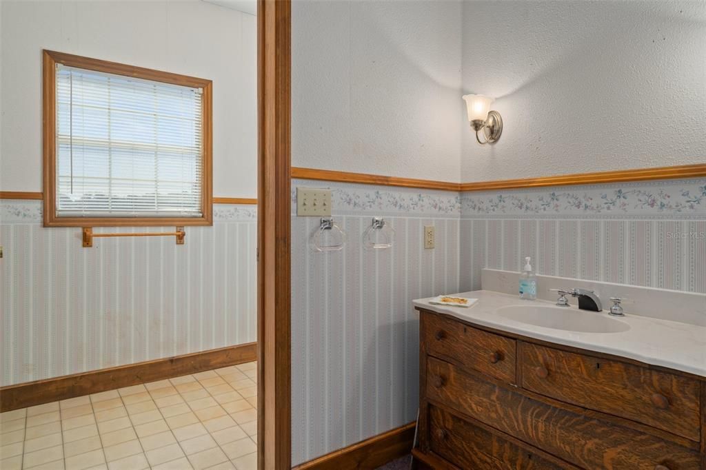 Full bath off mudroom and garage