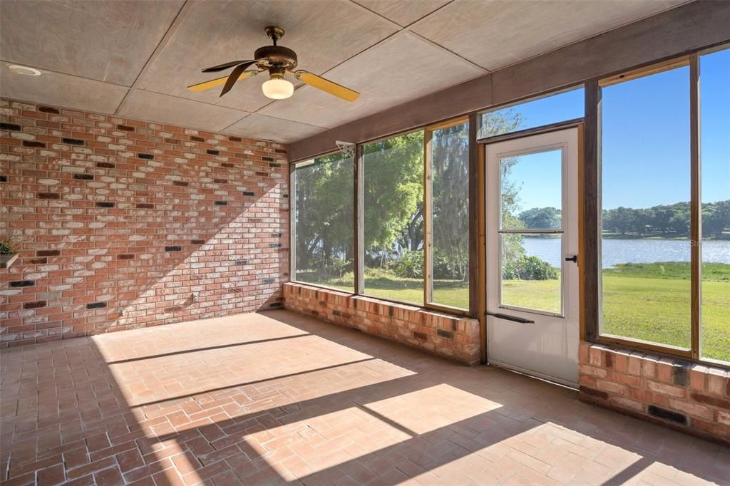 Back lanai/porch with lake views