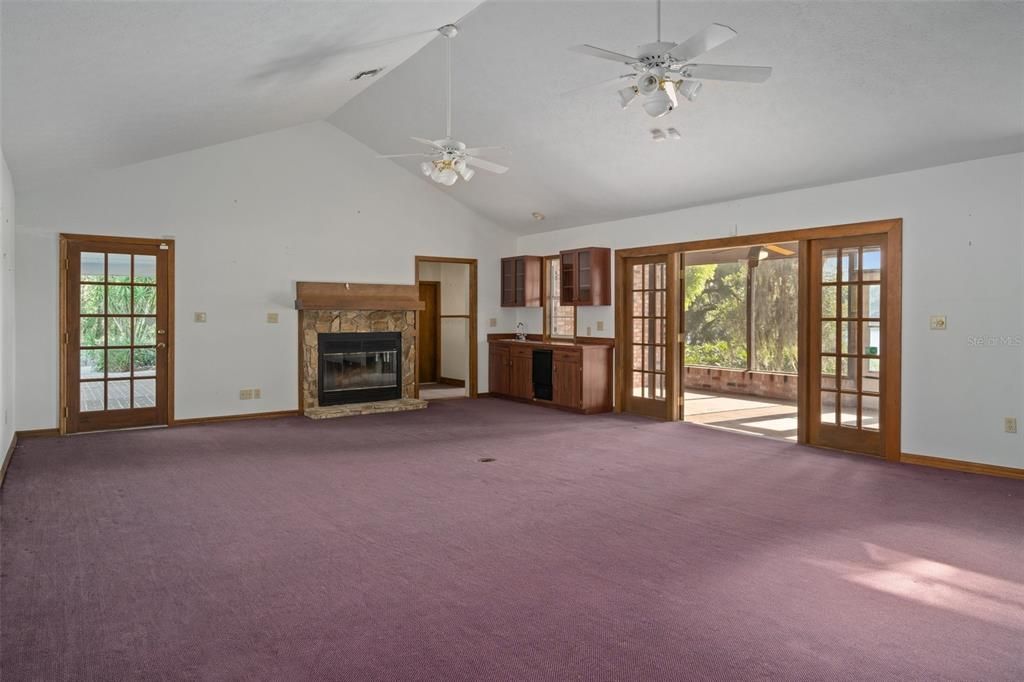 Great Room with doors to porch on east side of home