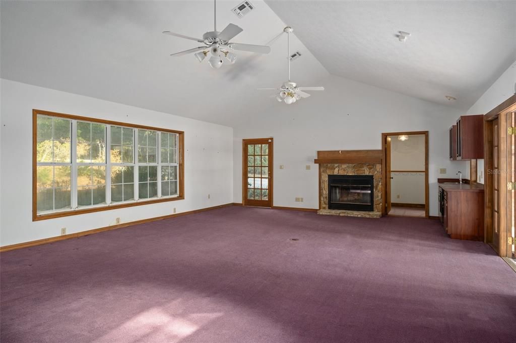 Great room-north end closest to garage. Wood burning fireplace