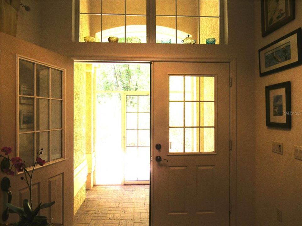 Grand Foyer' & Screened Entry With Pavers.