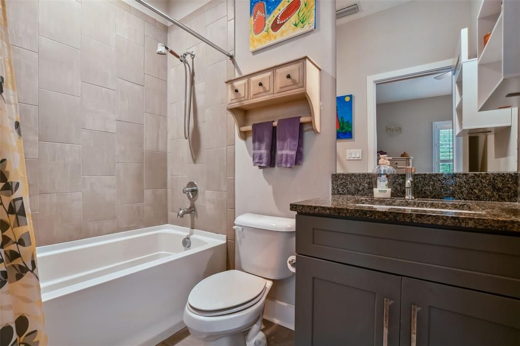 Guest Bedroom Bathroom with Shower/Tub combination.