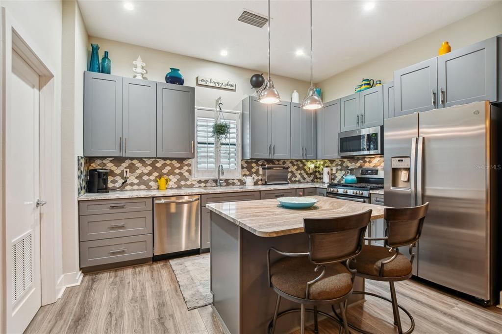 Kitchen includes all stainless appliances.