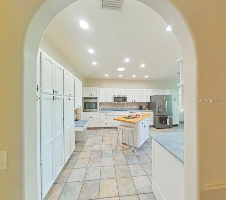Arched entrance to kitchen
