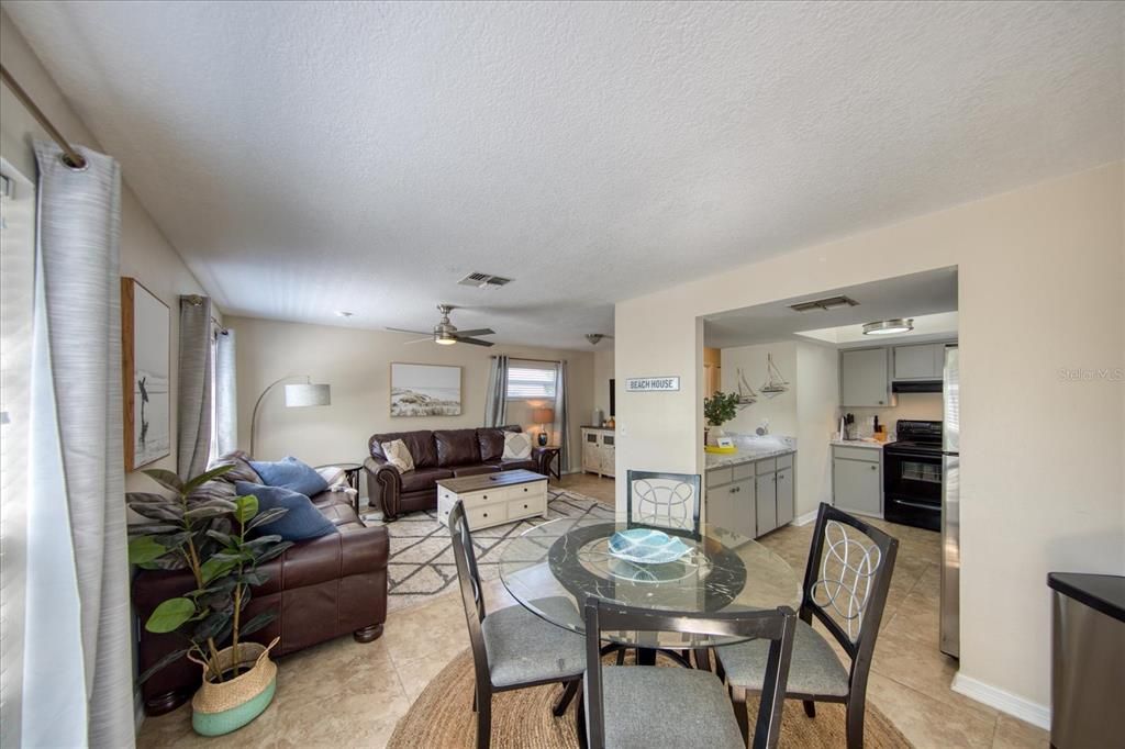 Upstairs unit shows lovely! Open floor plan beautifully appointed and completely furnished.