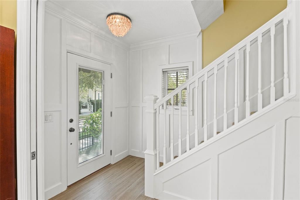 Beautiful Trim Work in Foyer and Stairwell Areas