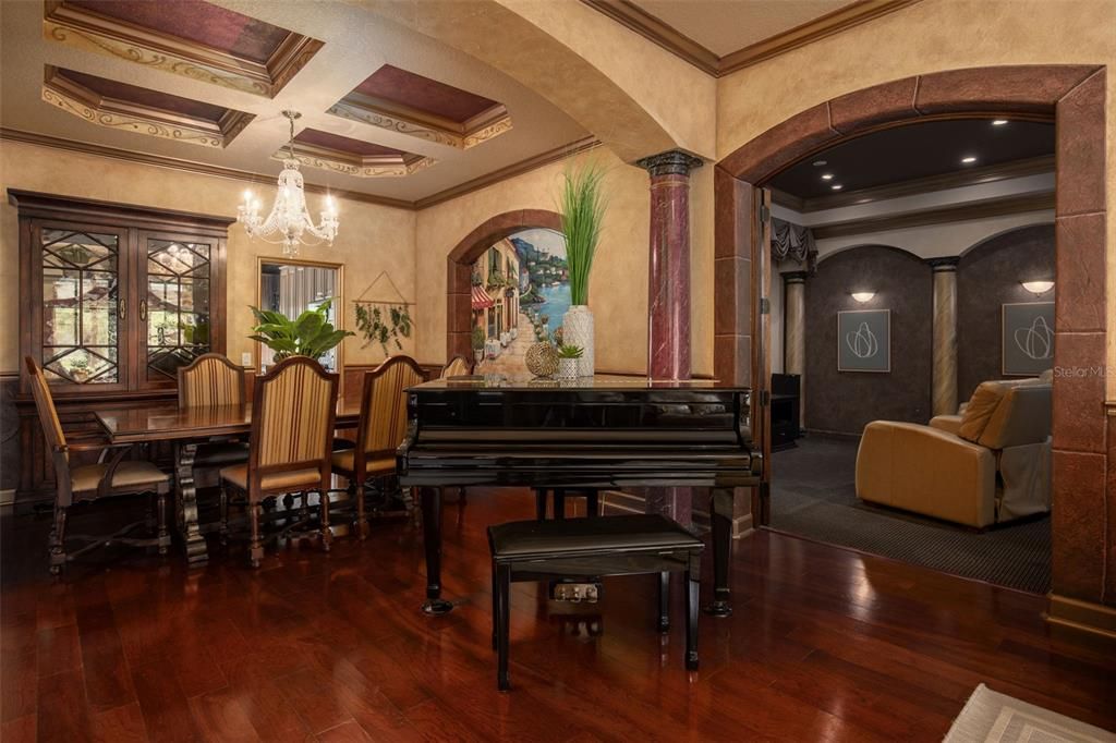 Looking into Theater Room to the right, Baby Grand Piano, Formal Dining Room