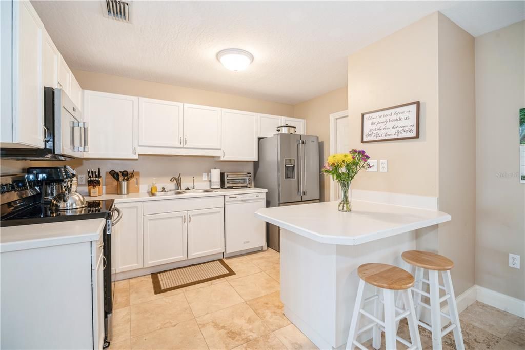 Kitchen and breakfast bar