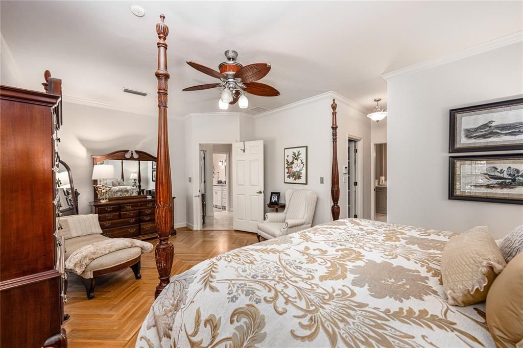 Crown molding, wood floors and two custom walk-in closets