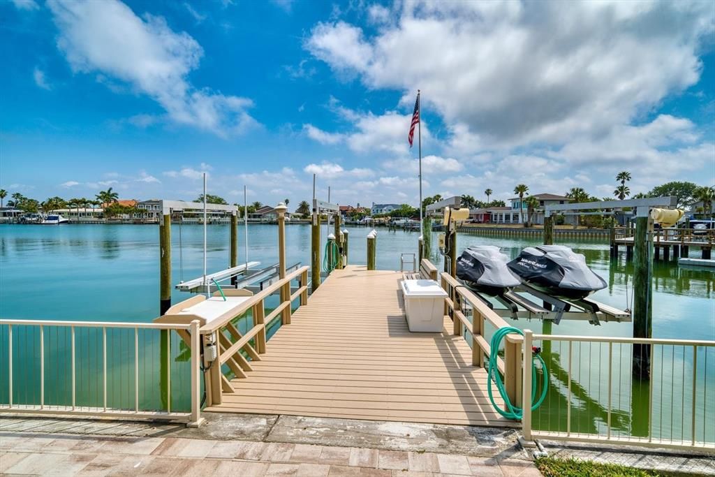 Newer dock with composite decking, cleaning station, water and electric. 2 lifts- one with 16,000 pound capacity and upgraded electrical the other has 10,000 pound capacity.
