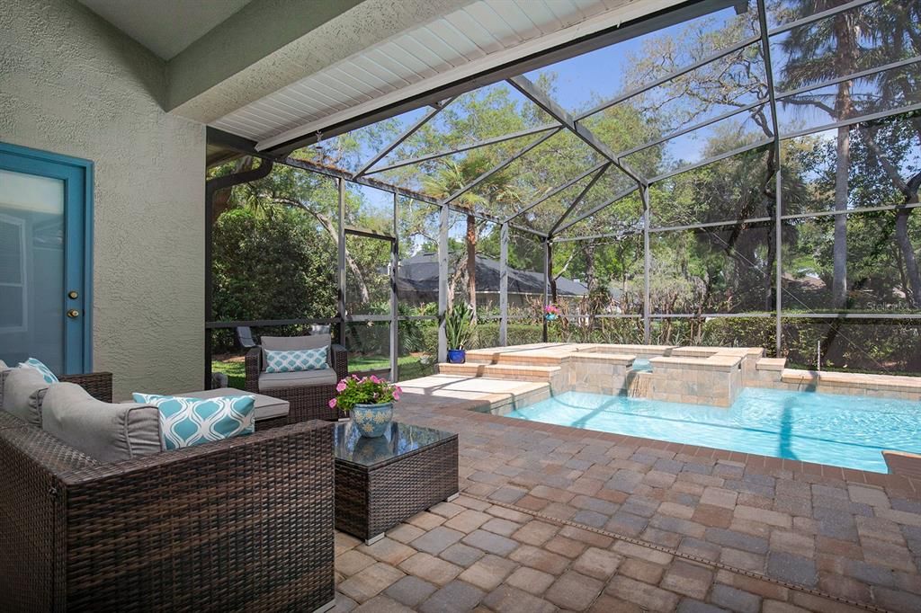 Covered lanai with sparkling screened pool