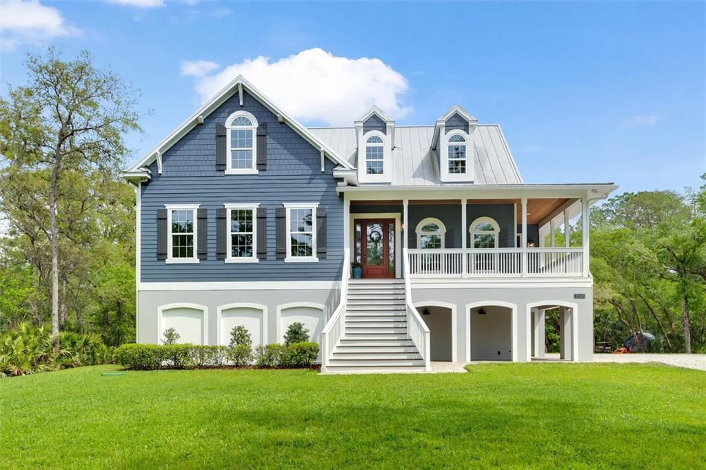 Main House View with Front Steps & Wraparound Porch