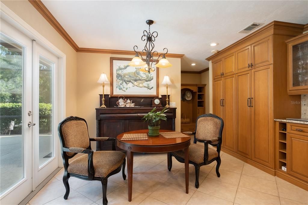 informal eating area in kitchen and so much storage space