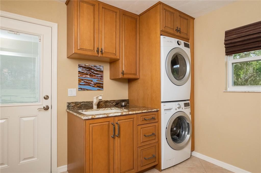 Laundry room with access to pool