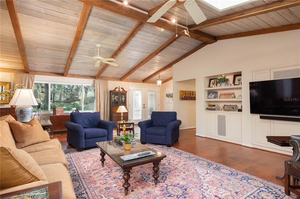 Living room looking toward front of home and entry