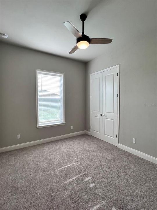 2nd Bedroom with Ceiling Fan and Light