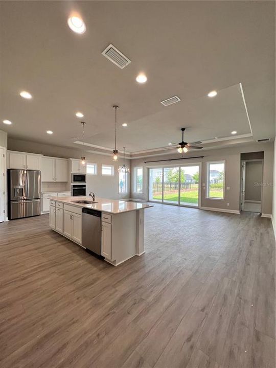 Open Floor Plan with many lights