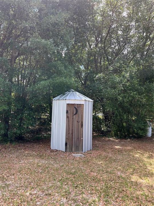 "outhouse" where well is stored