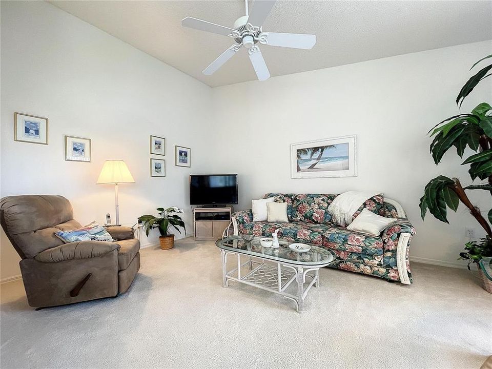 The family room is spacious with the high ceilings