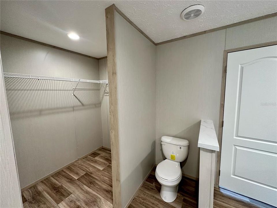 primary bathroom with walk-in closet #2