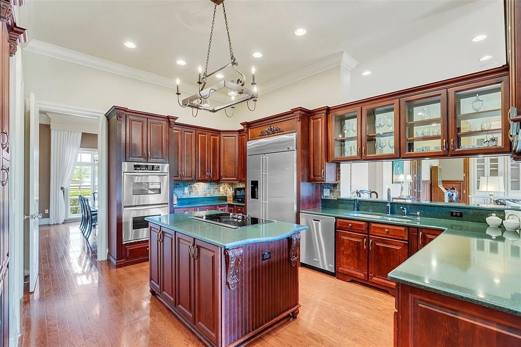 Chef's kitchen with cooking island and double ovens