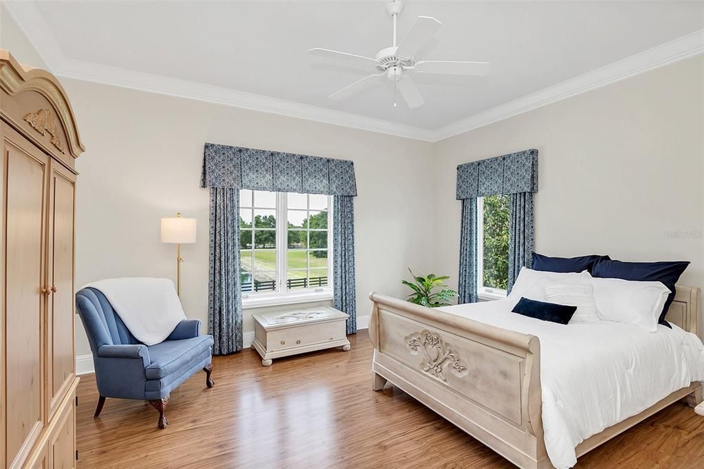 Bedroom suite #3 (upstairs) with front yard & pond views