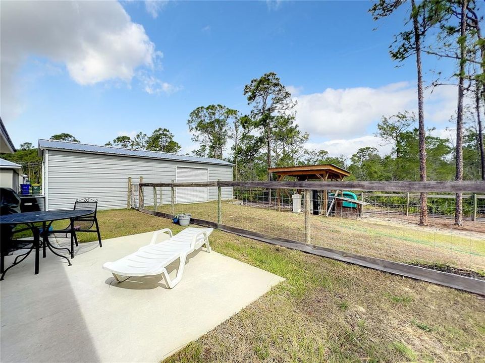 Backyard with added garage