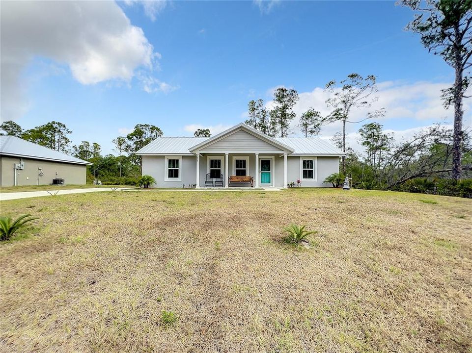 Home sits back so you have a pretty big front yard and long driveway.