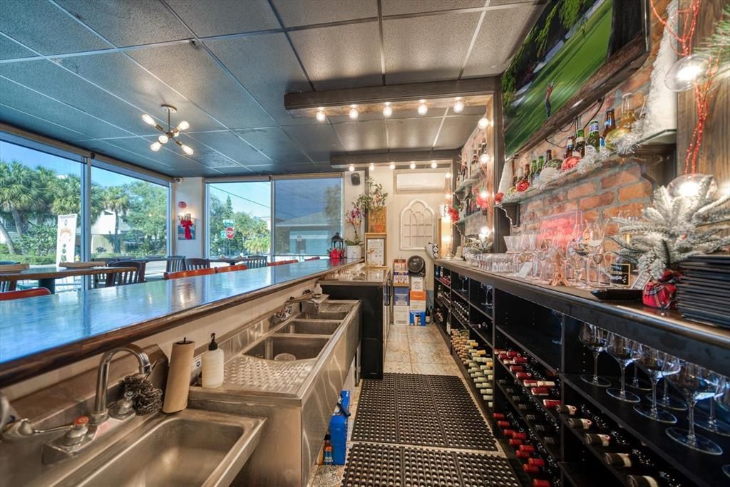 Bar area of restaurant in commercial space.