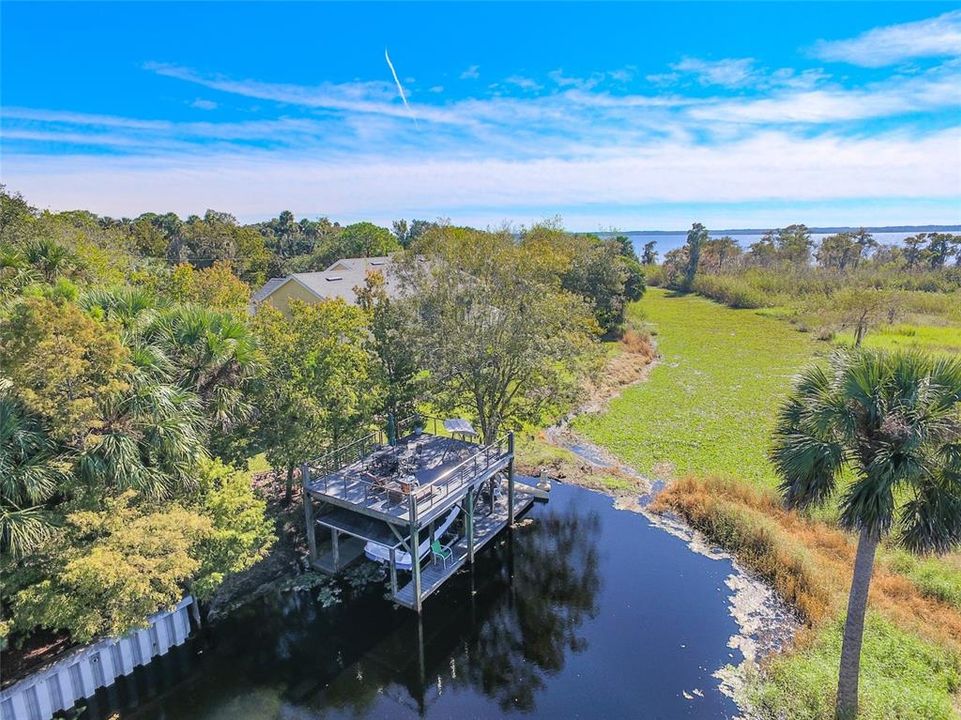 aerial with boathouse and home