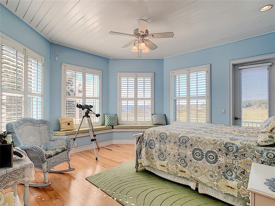 Main bedroom with walk around and Lake Monroe views