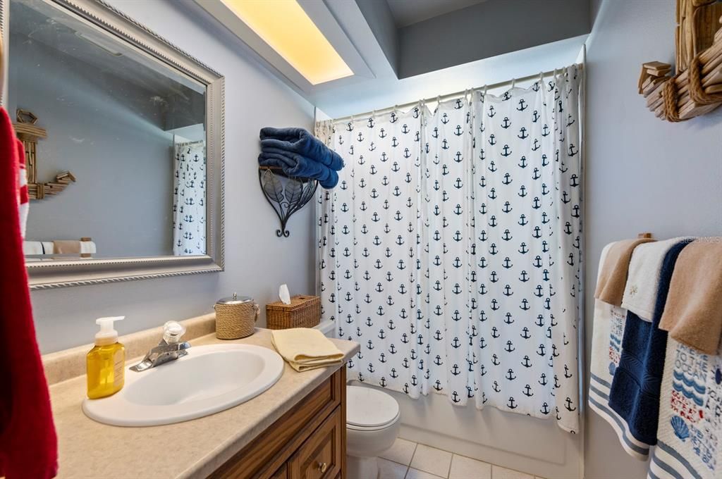 Guest Bath with single vanity, tub & bath