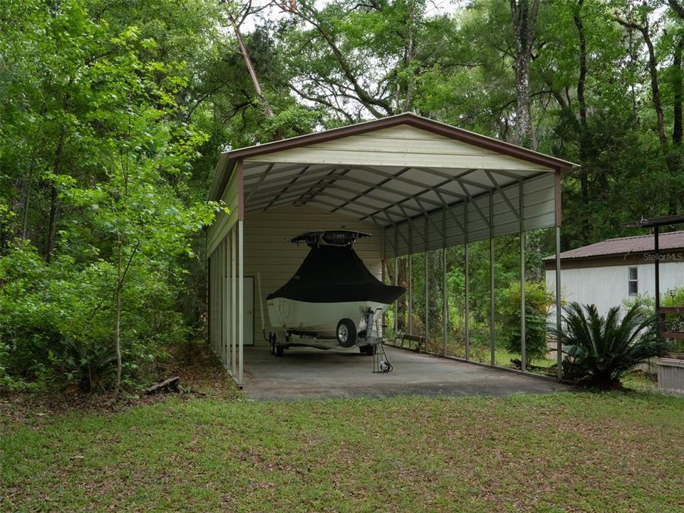 RV carport with enclosed storage