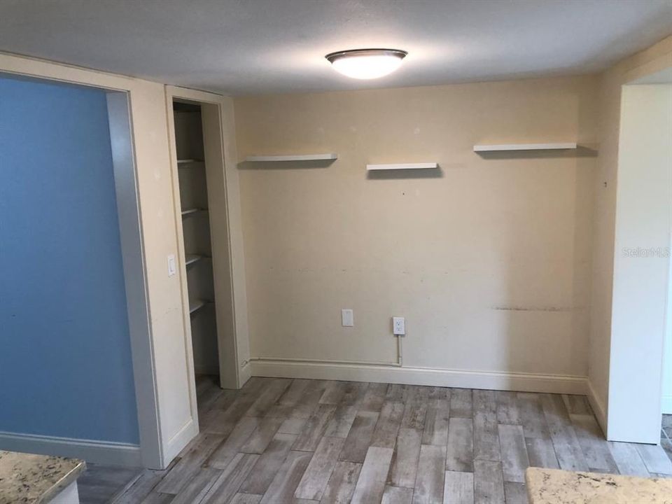 Eating area and pantry in kitchen.