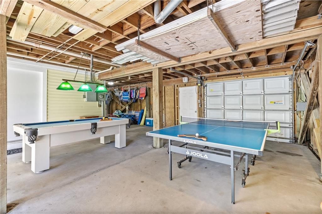 Garage doubles as a recreation room and can also house at least 4 cars.