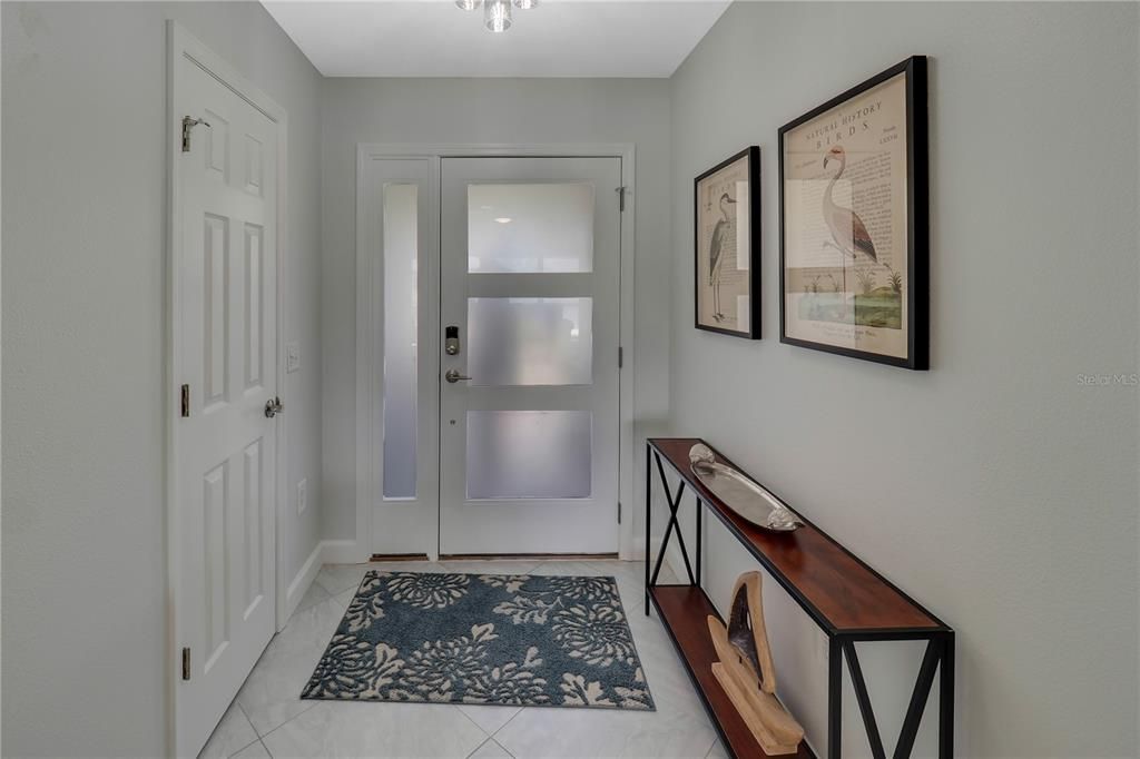 LEADS TO AN INVITING FOYER WITH CLOSET.....