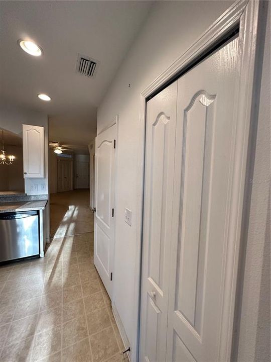 Kitchen w/ Storage Closet & Half Bath