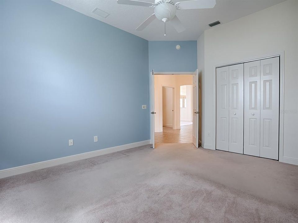 ACCENT WALL IN 3RD GUEST ROOM WITH LARGE CLOSET.