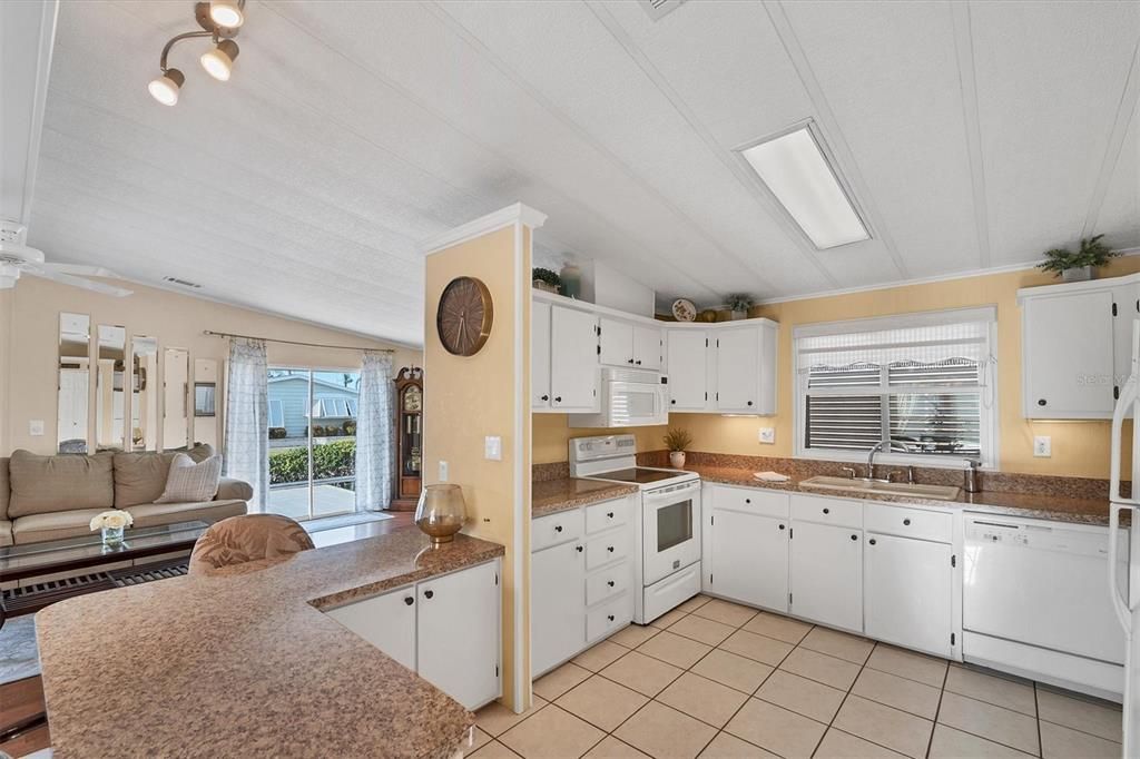 Open kitchen w/ breakfast bar