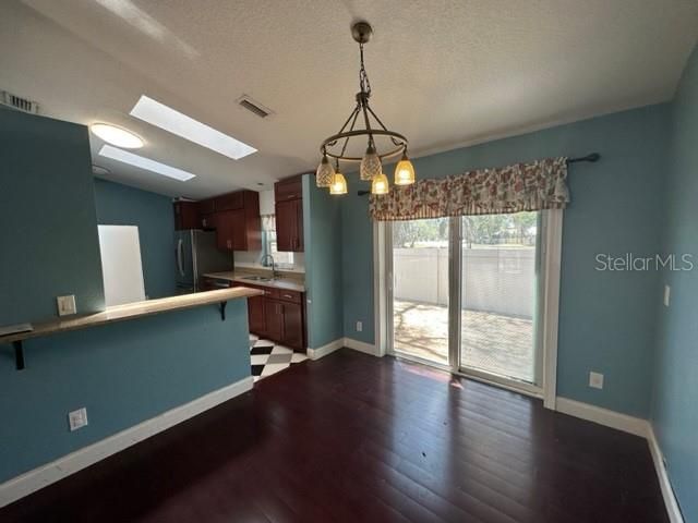 Wood-Look Laminate Flooring Throughout!