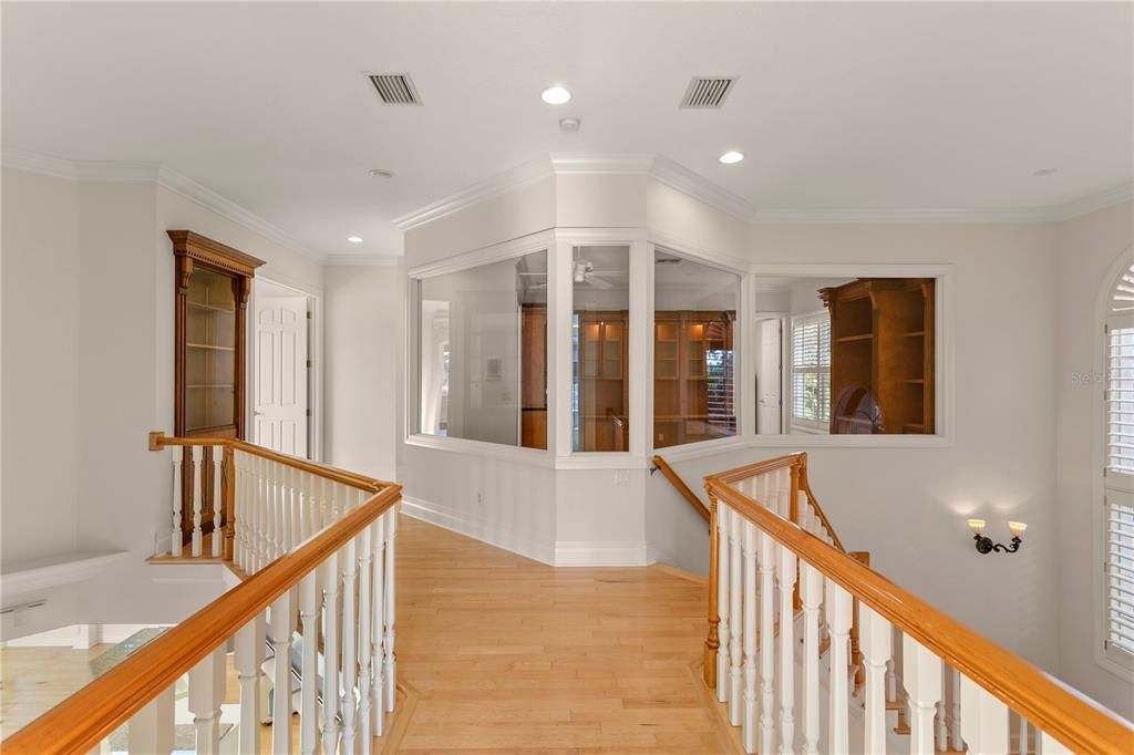 Hallway from Guest Bedrooms leading to East Wing Owners Suite and Office