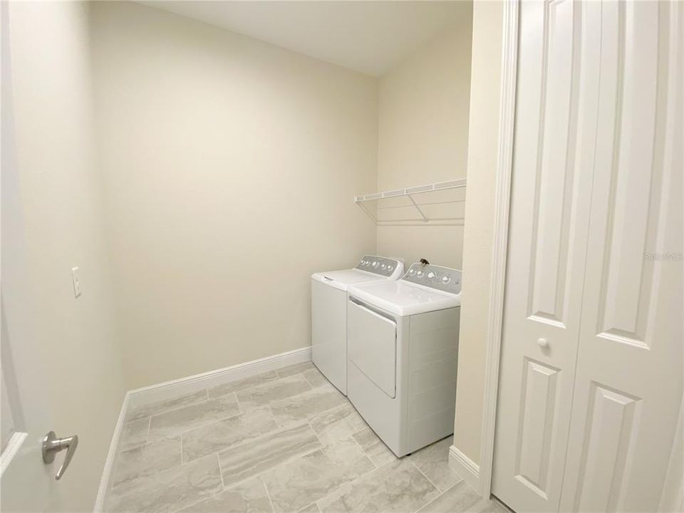 Laundry room with storage