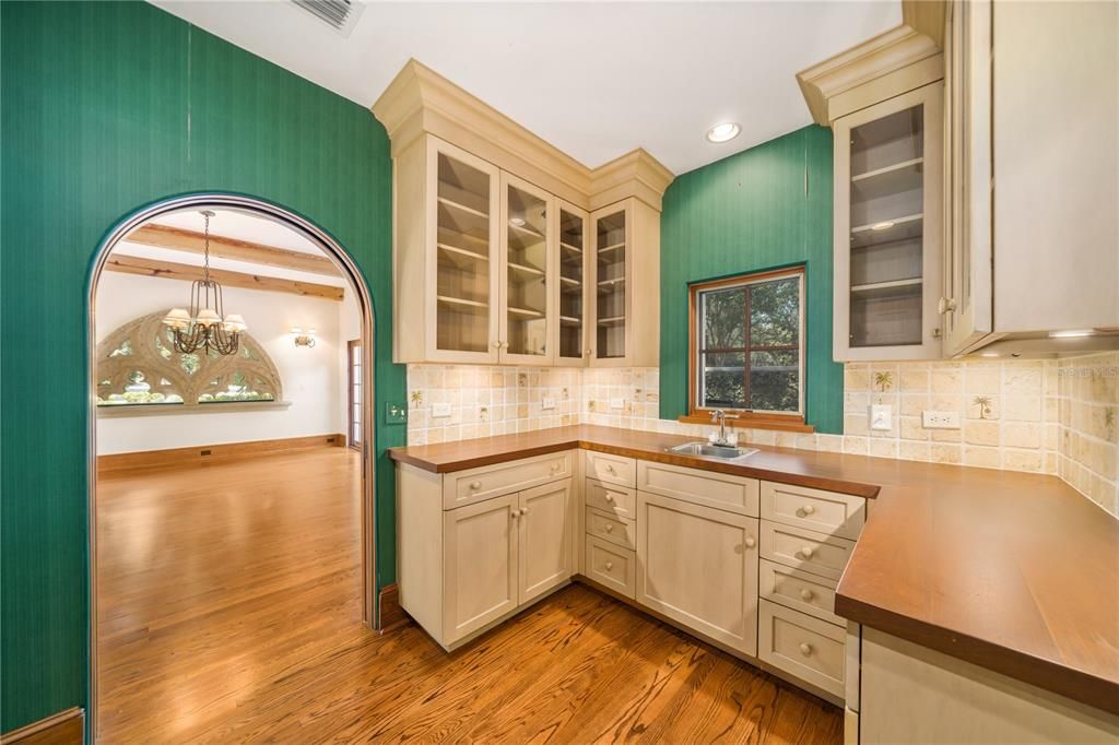 Butler's Pantry with easy access to the dining room and kitchen.