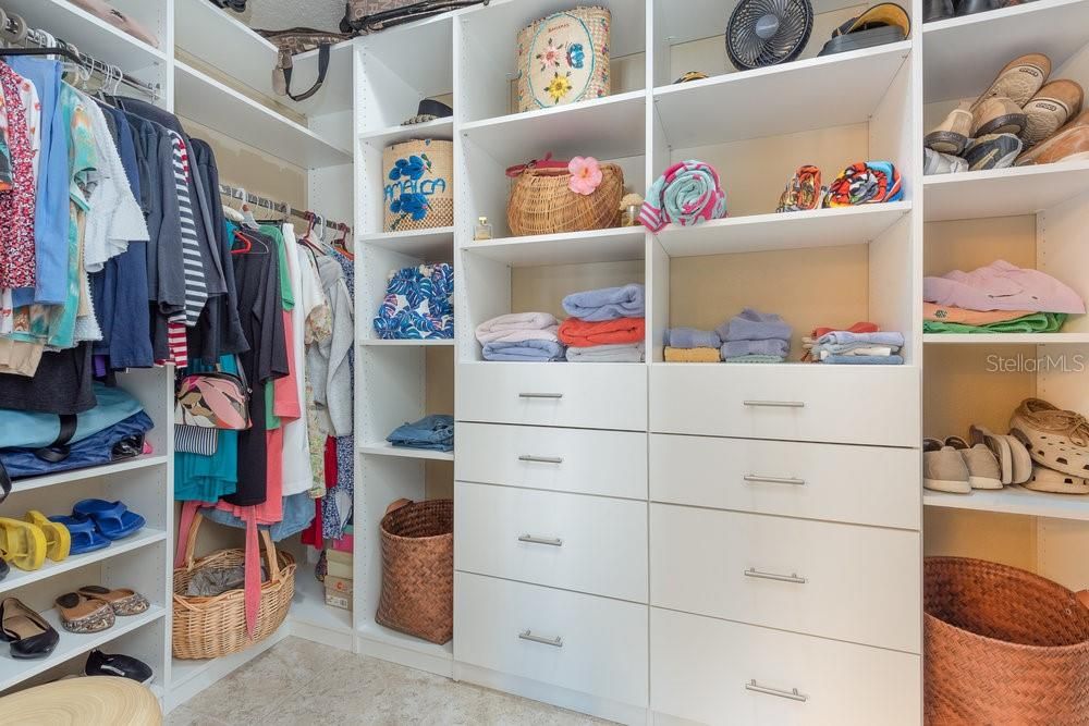 Primary bedroom closet w/custom shelves