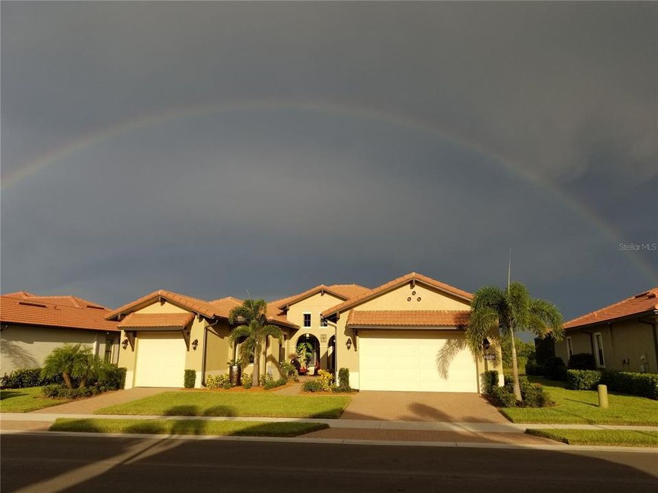 It's an omen!  A beautiful rainbow over the home.