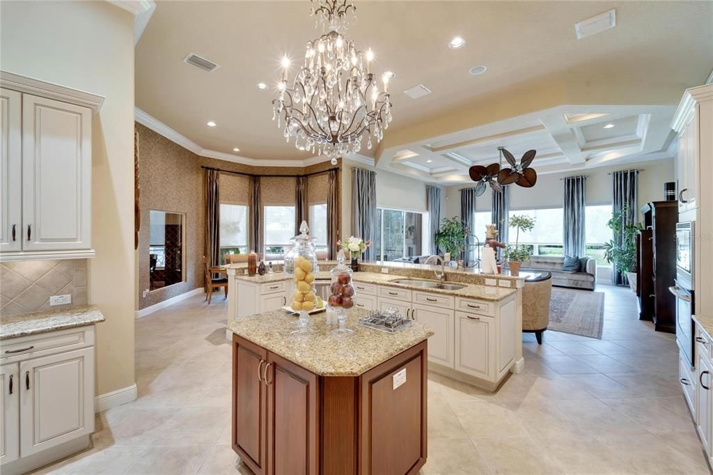 Kitchen with 2 islands overlooks family room